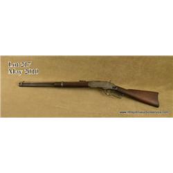 Winchester Model 1873 lever action SRC, patina  finish, wood stocks, #418336B. This gun is in  overa