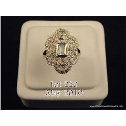 Spectacular 14 karat white gold ladies antique  design ring bezel set with a center Aquamarine and  