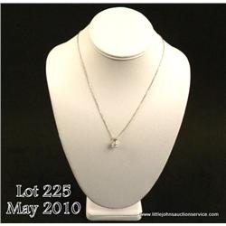 Ladies 14kt white gold diamond pendant weighing  over 1.50 carats with 18-inch white gold chain.  $1