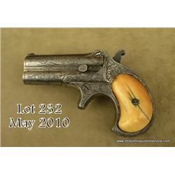 Engraved Remington O/U derringer .41 cal., 3”  barrels, nickel finish, ivory grips, #1281.  This  gu
