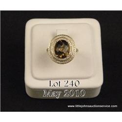 Ladies 14kt yellow gold ring set with a  checkerboard cut smoky topaz (5.00 ct) and 0.46ct  diamonds