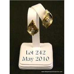 One pair of gold leaf design earrings in 18K  yellow gold (11.7gms)  and set with 6 diamonds (  wt  