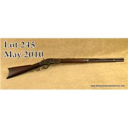 Winchester Model 1873 lever action rifle, .44 WCF  cal., 24” octagon barrel, blue finish, wood  stoc