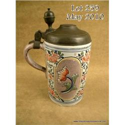Large early porcelain stein, approx. 10” high and  with a 4” diameter body, beautiful colorful  flor