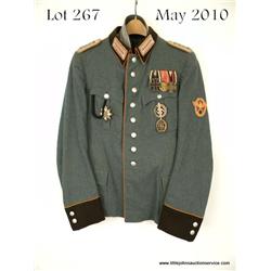 WWII German Rural Police NCO Uniform group  consisting of the tunic, medal bar, breast badges  and c