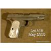 Image 3 : Colt Model 1903 semi-auto pistol, .32 cal., 4”  barrel, nickel finish, pearl grips, #377828. This  g