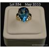 Image 1 : Superb10 karat yellow gold ladies ring set with a  large pear shape sky blue topaz weighing approx. 