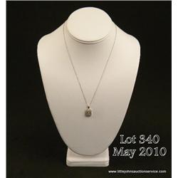 Beautiful 14 karat white gold ladies designer  pendant pave set with 32 round diamonds weighing  app