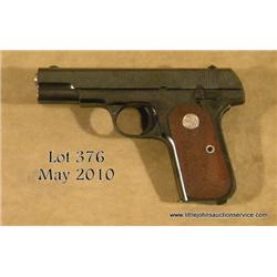 Colt Model 1903 semi-auto pistol, .32 cal., 4”  barrel, blue finish, checkered medallion wood  grips