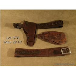 Lot of three old Western pieces of leather  including an unmarked tooled leather double loop  holste