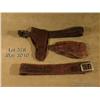 Image 1 : Lot of three old Western pieces of leather  including an unmarked tooled leather double loop  holste
