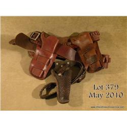Lot of three leather holster rigs including an  unmarked double loop holster for a Colt SAA 7-1/2”  
