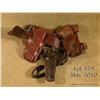 Image 1 : Lot of three leather holster rigs including an  unmarked double loop holster for a Colt SAA 7-1/2”  