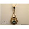Image 2 : One pendant set with a round blue zircon approx  3ct in 10K yellow gold,  with a chain. Est.  $400-$