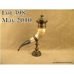 Large beautifully ornamented toasting horn,  approx. 23” overall with 10” high brass stand in  overa