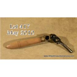 Unmarked brass bullet mold with iron cutter and  wood handle, possibly for a Starr revolver in  over