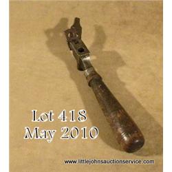 Unmarked iron bullet mold with iron cutter and  large wood handle, possibly for a Starr revolver  in