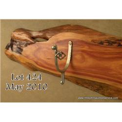 Wooden rifle wall display made of an irregular  slab of log, with US marked Spanish American War  sp