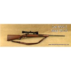 Ruger Model 77 bolt-action rifle, 25-06 cal., 25”  round barrel, blue finish, jeweled bolt, checkere