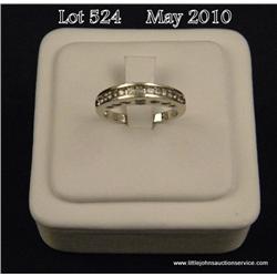 High quality 14 karat white gold ladies  anniversary design ring channel set with 13 round  diamonds