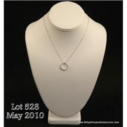 One diamond pendant set with 0.24ct. of diamond  and made of 14 kt white gold. Est. $300-$850