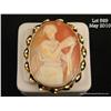 Image 1 : One beautifully carved shell cameo with a maiden  with urn motif framed in 14 k yellow gold as a  br