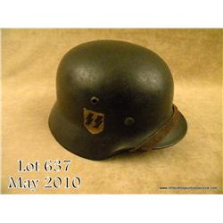 Waffen SS M35 double decal combat helmet with  Waffen SS and Party decals. Complete with original  l