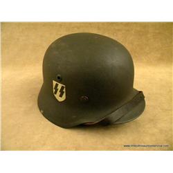 : M35 single decal Waffen SS combat helmet  retaining SS decal on the right side, and is  complete w