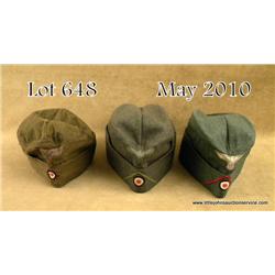 Lot of 3 German army overseas caps; One tropical,  two continental. Complete with all insignia. In  