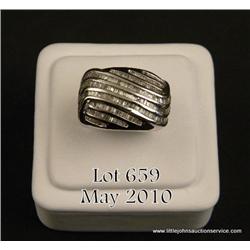 Dazzling 10 karat white gold ladies ring channel  set with over 235 baguette cut diamonds weighing  