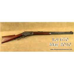 Whitney-Kennedy lever action rifle, 24” round  barrel, full magazine, rifle butt in good to very  go