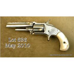 Smith & Wesson model 1-1/2 .32 caliber rimfire  revolver, nickel plated, pearl grips, period or  fac