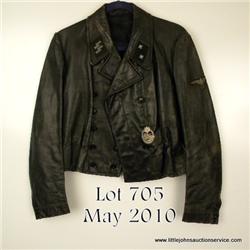 Leather jacket with applied SS decorations. Jacket  is WWII period, insignia are costume for  reenac