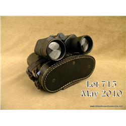 Pair of case German army issue officer’s field  glasses. 7x50. Nice clear optics with range  finding