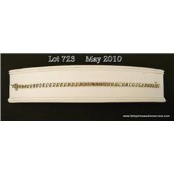 14 karat yellow gold ladies S- link style tennis  bracelet set with 44 round diamonds weighing  appr