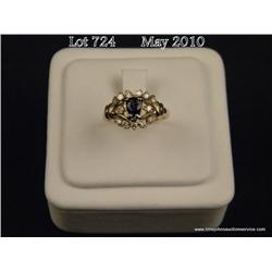 High quality 14 karat yellow gold ladies set with  a fine pear shape Ceylon color sapphire weighing 