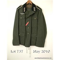 Model 1936 Army service tunic and britches.  Enlisted tunic with incorrect associated shoulder  stra