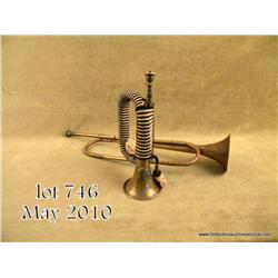 Lot of 2 German trumpets; one SA complete with  trumpet cords, insignia, and mouthpiece. A Hitler  y