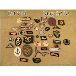 Lot of miscellaneous WWII German uniform trade  patches, NCO rate patches, cuff titles. Est: $600  -