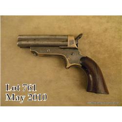 Sharps four barrel derringer, .30 cal., brass  frame, 3” iron barrels, rosewood grips, #2898.  This 
