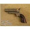 Sharps four barrel derringer, .30 cal., brass  frame, 3” iron barrels, rosewood grips, #2898.  This 