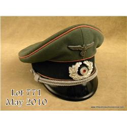 WWII German Panzer officer’s visor cap complete  with original insignia, chin cords, and leather  li