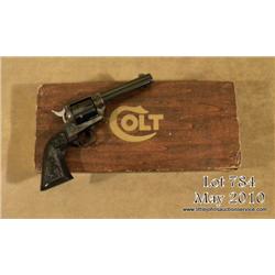 Colt Peacemaker .22 Single Action revolver, .22LR  cal., 4-3/8” barrel, blue and case hardened  fini