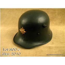 Irish M16 style helmet circa 1920’s. Helmet  retains 98% of its original green-painted finish  and f