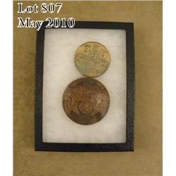 Lot of two antique collectible medallions  including a bronze commemorative to Augustus  Saint-Gaude