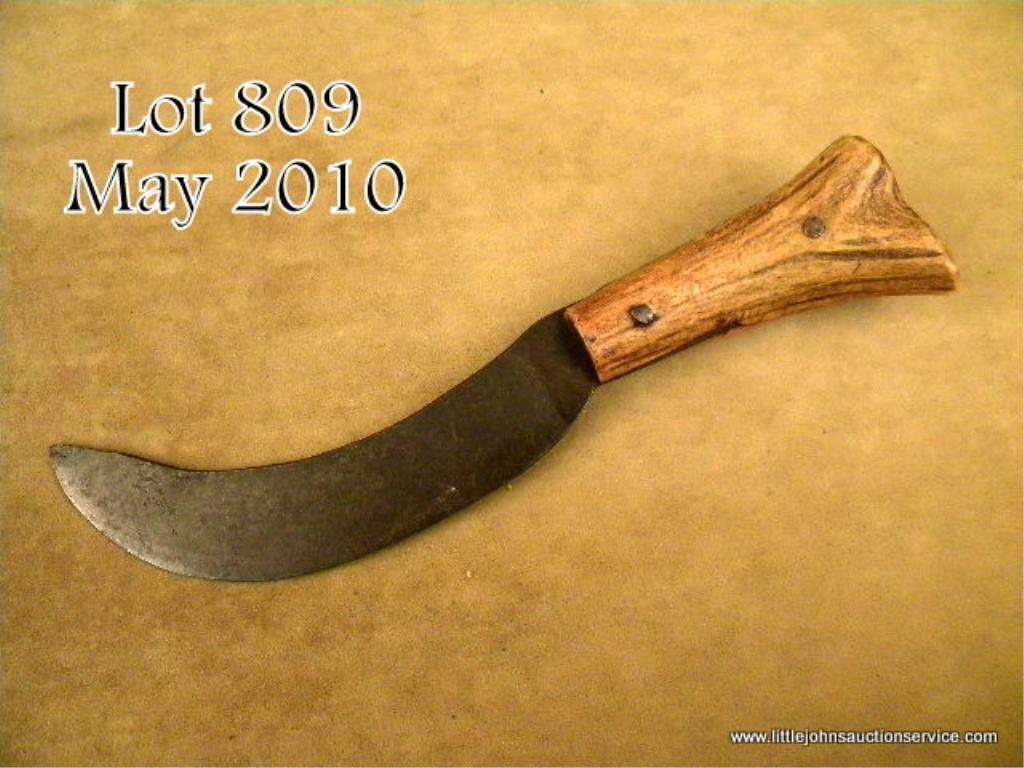 Antique curved blade skinning knife with classic worn stag grip