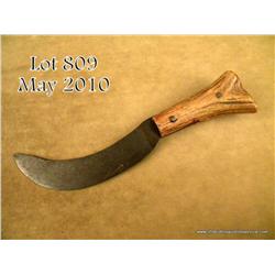 Antique curved blade skinning knife with classic  worn stag grip attached by two iron pins, approx. 