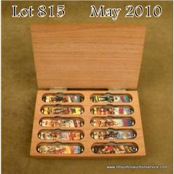 Set of ten Western commemorative pocket knives in  wood case in overall good condition including  Ho