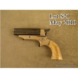 Sharps four barrel derringer, .30 cal., 3”  barrels, brass frame, marine ivory grips, #2586.  This g
