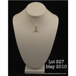 Pleasant 14 karat yellow gold ladies handmade  pendant set with a center Opal weighing approx.  2.00